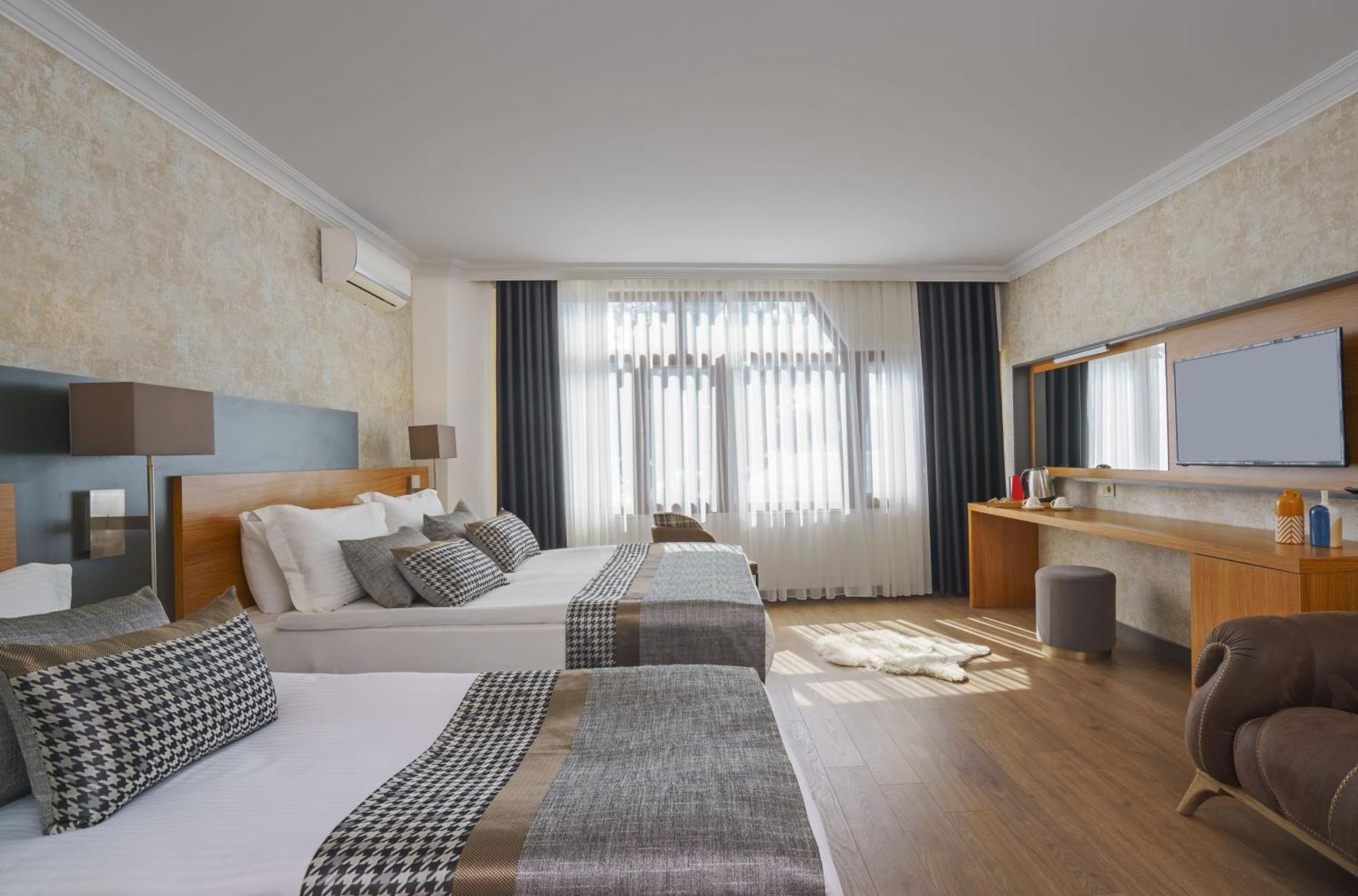 Otel Qinn *