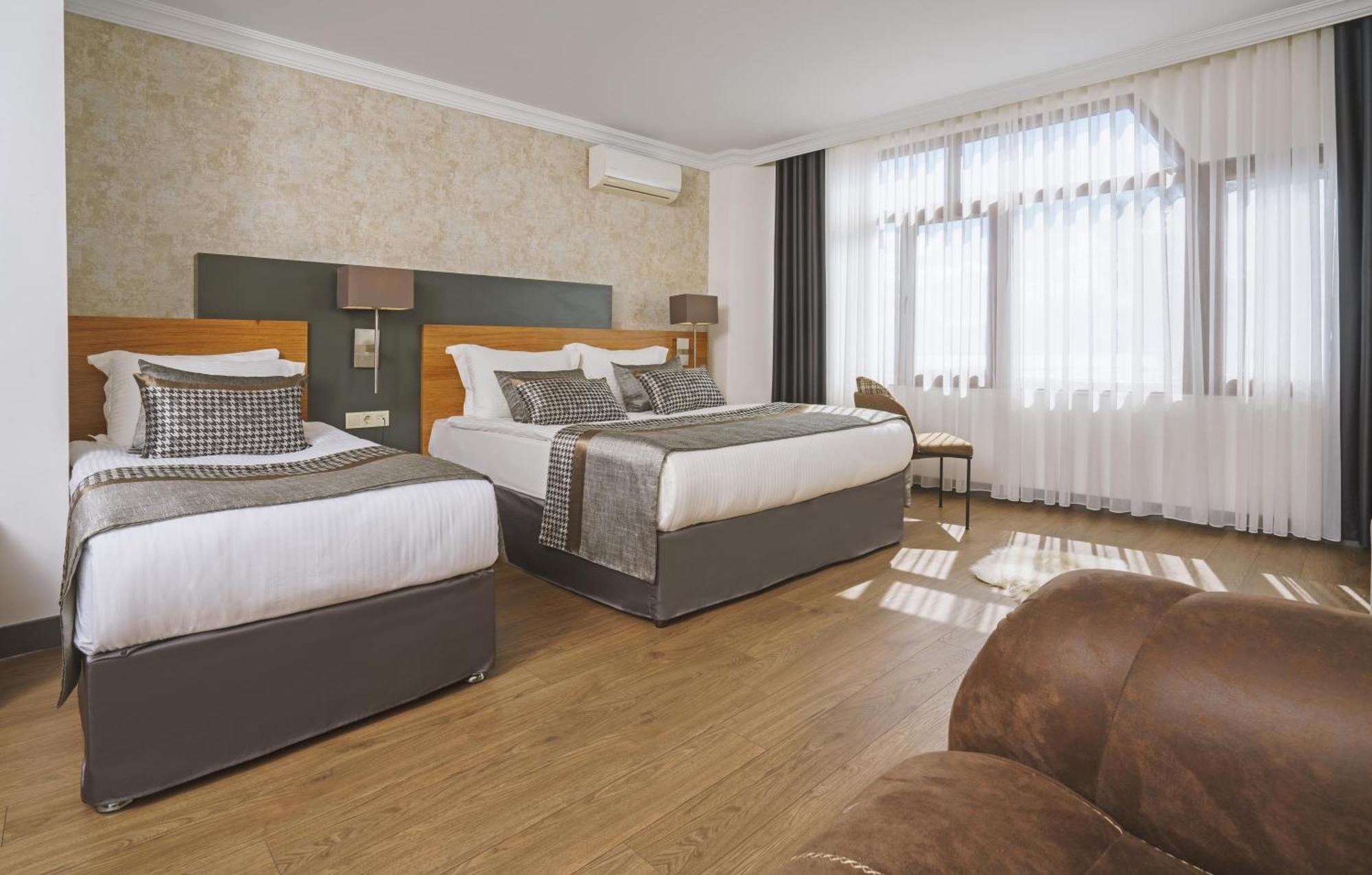 Qinn Otel *