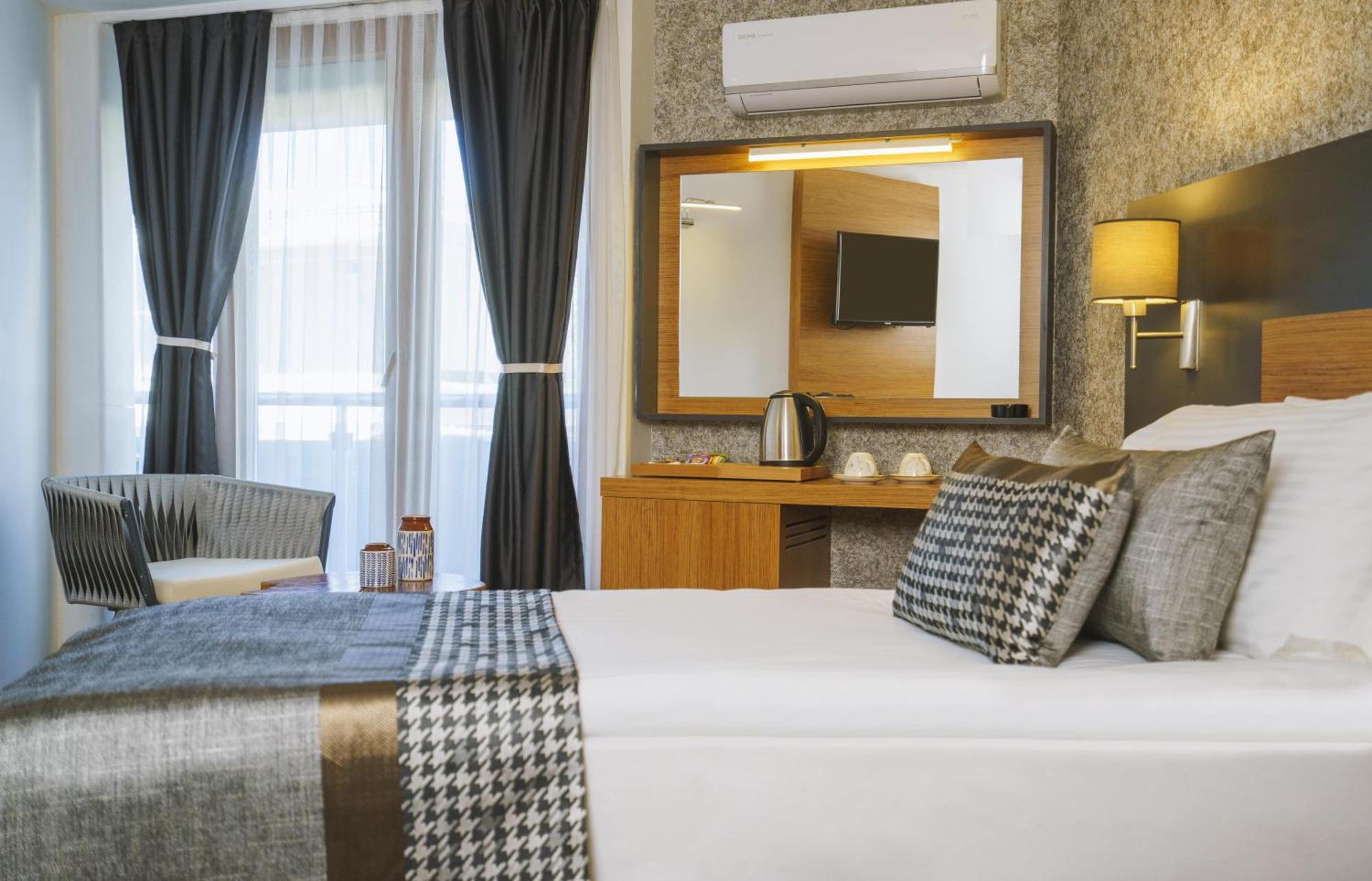Qinn Otel *